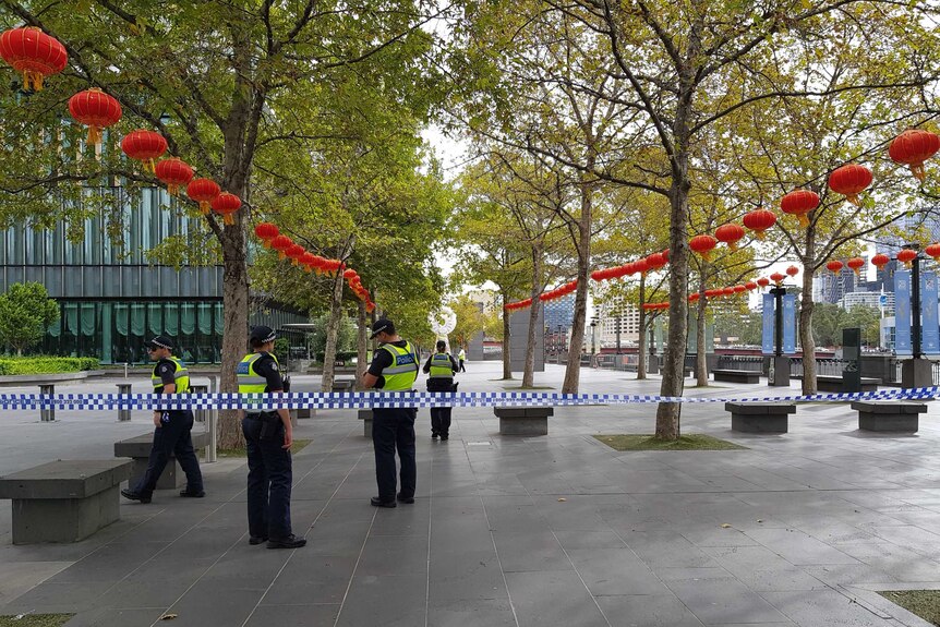 A section of the promenade outside Crown Casino is blocked off by police.