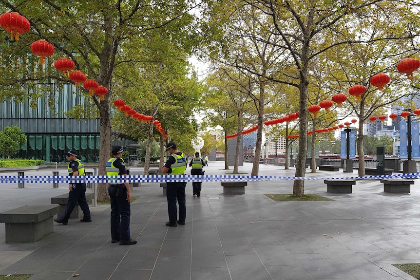 A section of the promenade outside Crown Casino is blocked off by police.