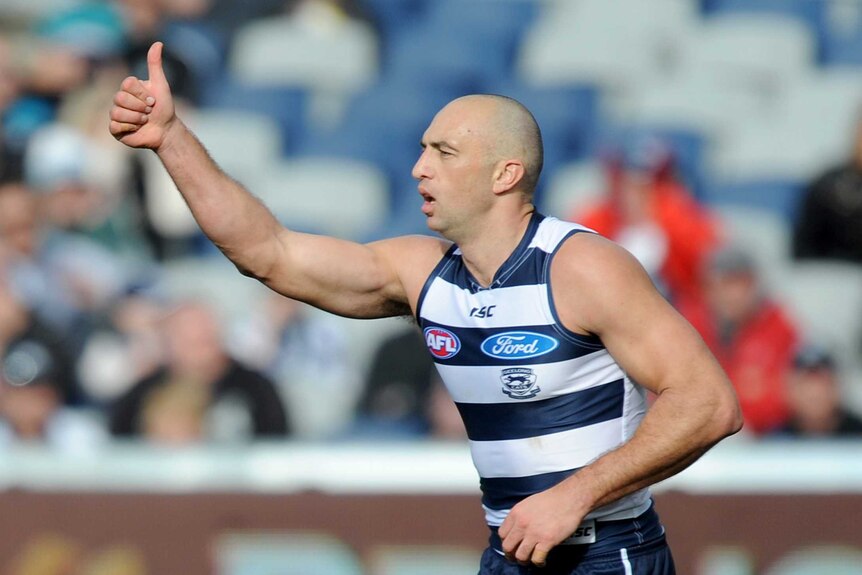 Geelong's James Podsiadly celebrates his goal against Port Adelaide at Kardinia Park.