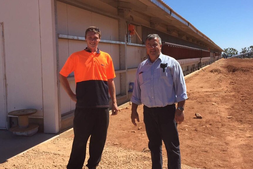Days Eggs Managing Director Dion Andary and senior stockperson Wade Pietriala out the front of shed one