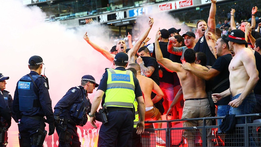 Western Sydney Wanderers fans let off flares at Docklands against Melbourne Victory in A-League.