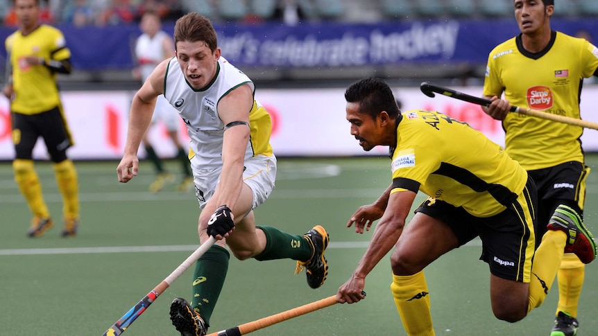 Simon Orchard in action for the Kookaburras