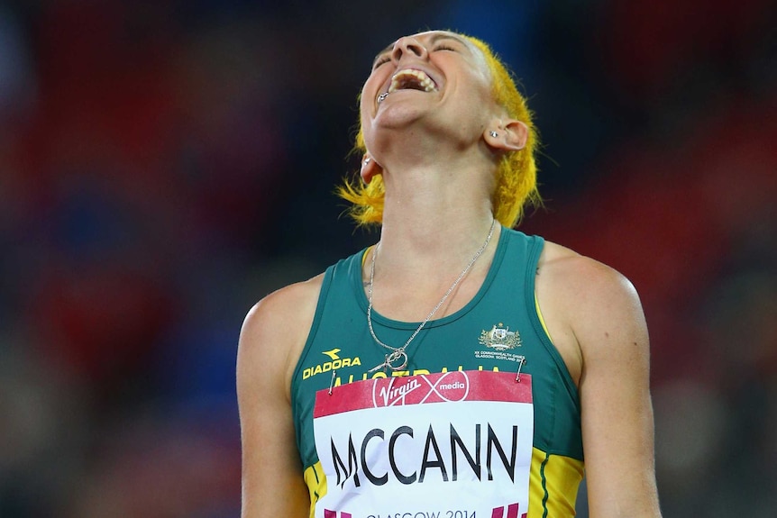 Shannon McCann celebrates reaching the 100m hurdles final