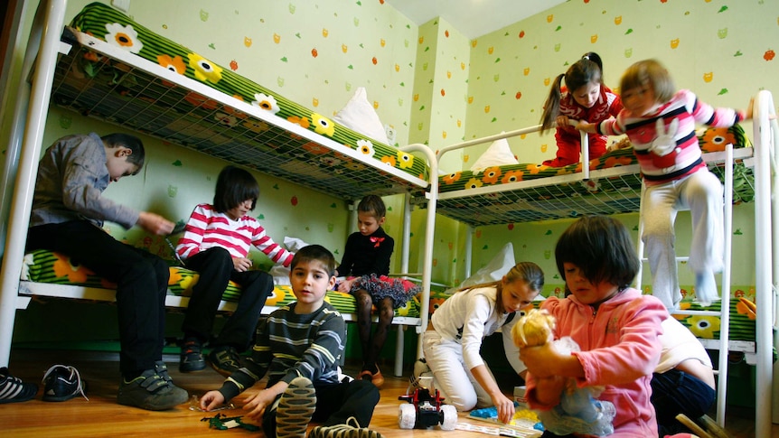 Children play in their bedroom at an orphanage in the southern Russian city of Rostov-on-Don.