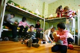 Children play in their bedroom at an orphanage in the southern Russian city of Rostov-on-Don.
