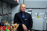 Rebel flight attendant Steven Slater stands in the galley of a jet