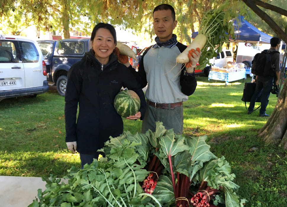 Chaiaki Ohira and John Lai show off their produce.