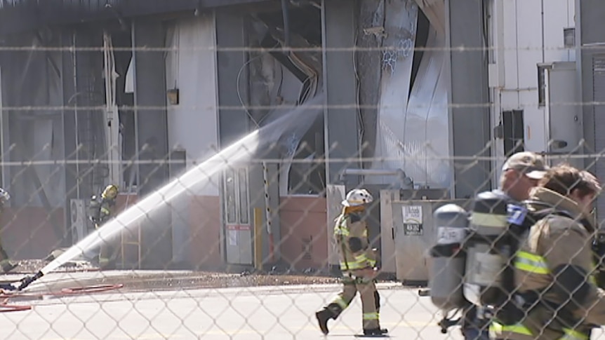 Firefighters at the Swickers Bacon Factory