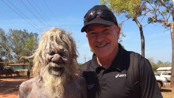 A Galiwinku traditional owner with Rob de Castella from the Indigenous Marathon Project at a fun run on Elcho Island.