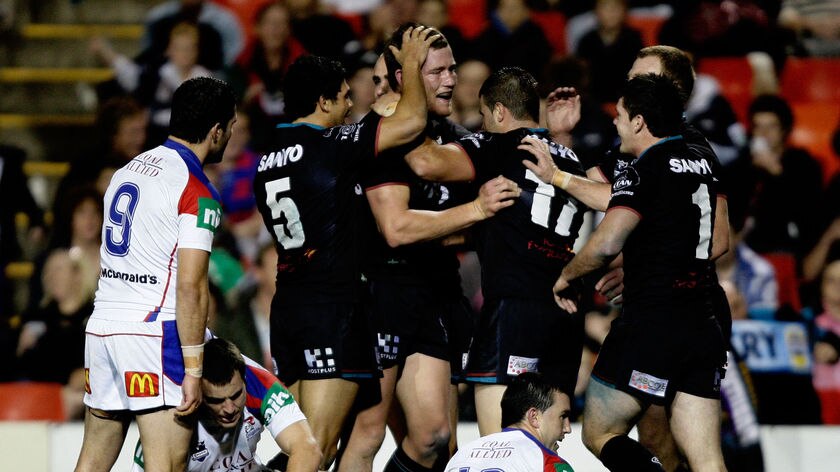 Sparkling form: The Panthers celebrate Gavin Cooper's try.