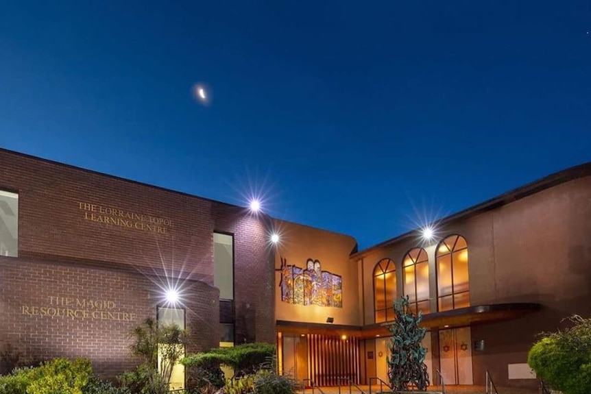 Night time external shot of Temple Beth Israel.