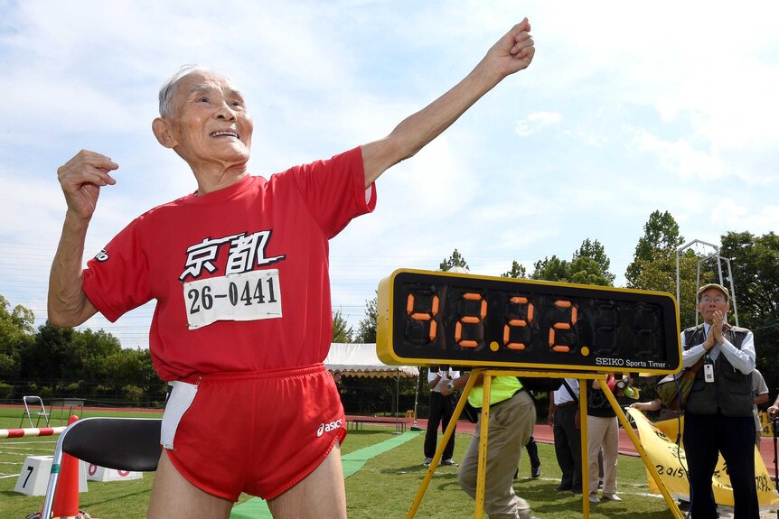 Hidekichi Miyazaki strikes a lightning pose