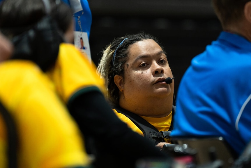 an australian player with dreadlocks on court at the powerchair football world cup in sydney