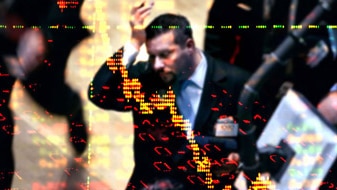 Downcast stockbroker with graphic overlay