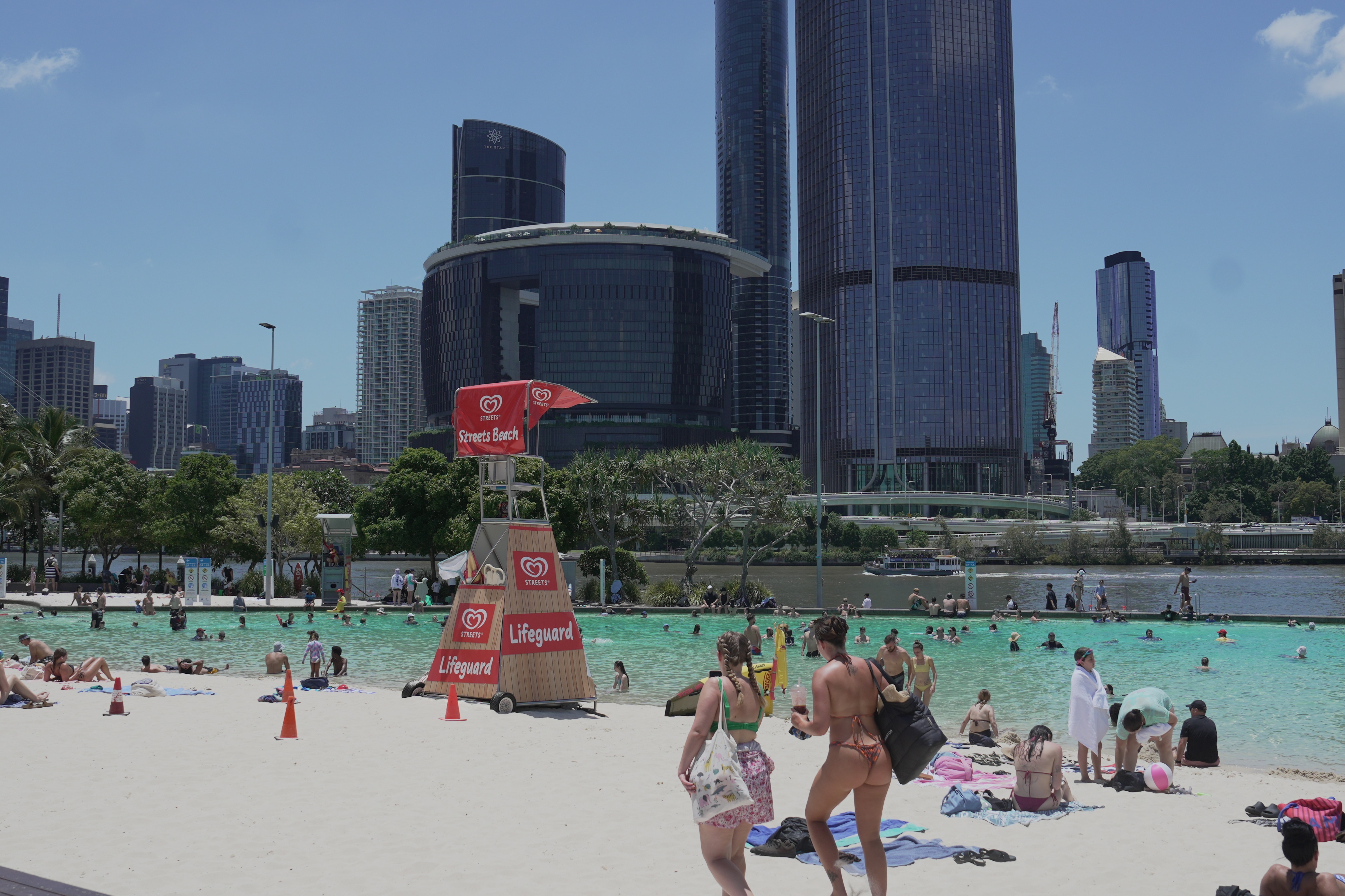 Brisbane set for hottest Australia Day so far this century, as north faces soaking