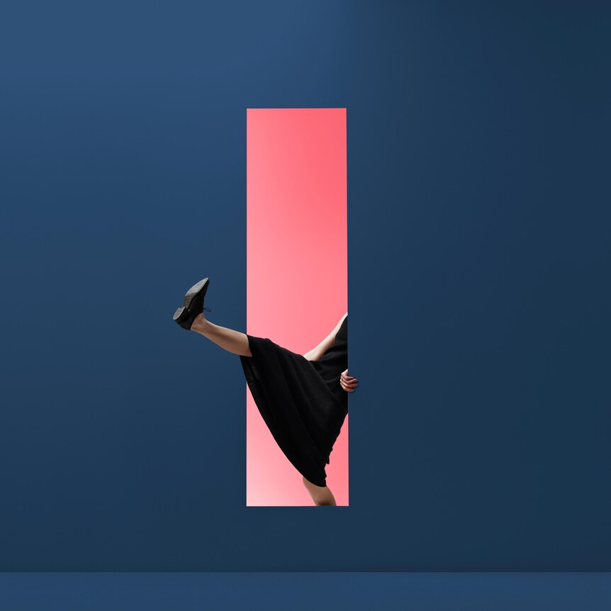 Person's leg and foot walking through a thin door from a pink void into nothing