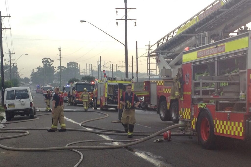 Fire and Rescue NSW crews attend the scene of a fire in Yennora in western Sydney.