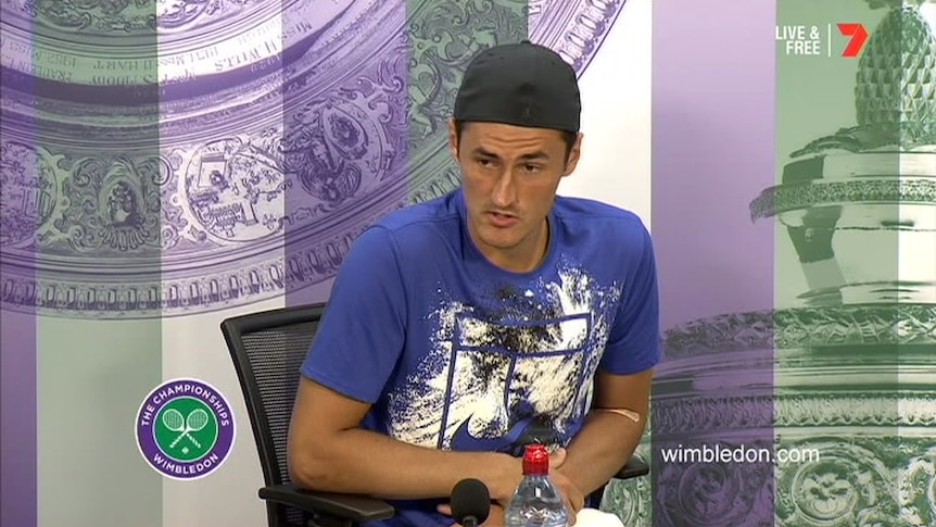 Bernard Tomic at a Wimbledon post-match press conference following his loss to Mischa Zverev.