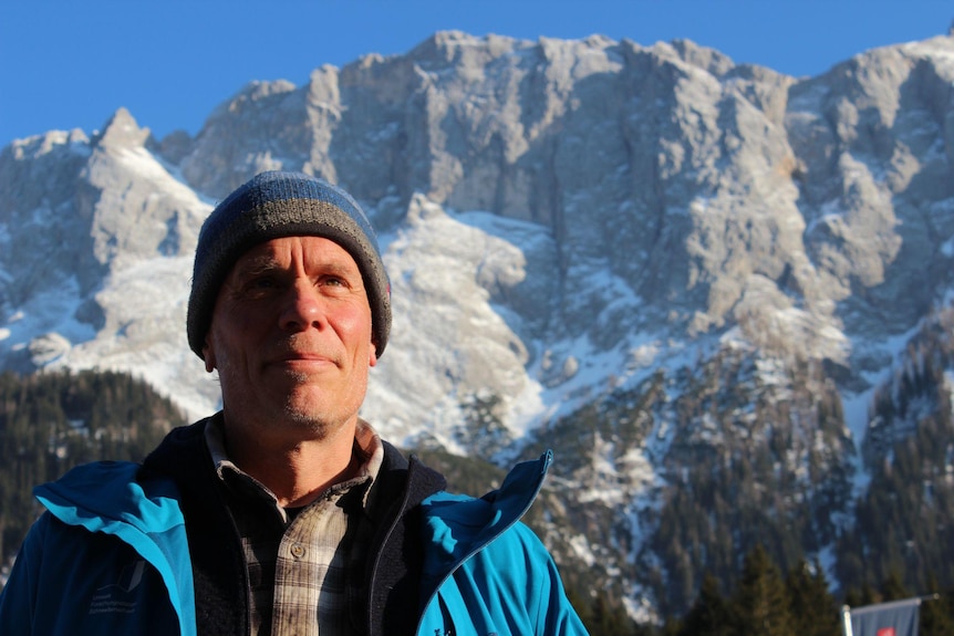 Dr Hannes Vogelmann with the German alps behind him