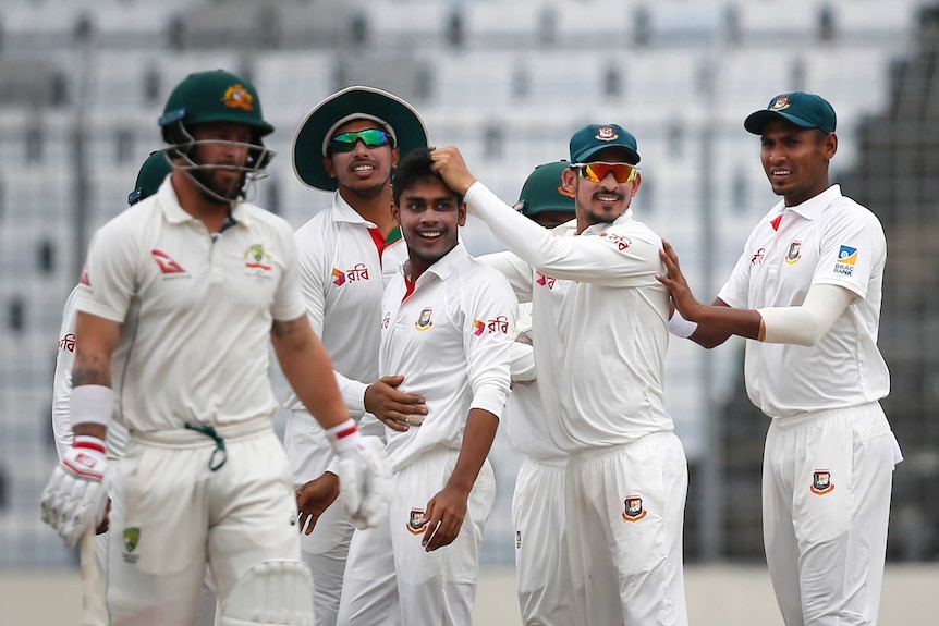 Matthew Wade trudges off as Bangladesh celebrates