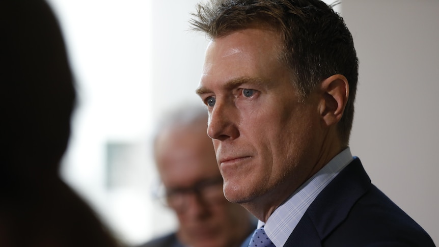 What is a blind trust and what role did it play in Christian Porter's resignation?