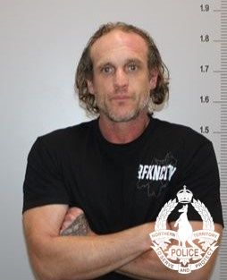 Seven arrested as police manhunt for escaped bikie continues