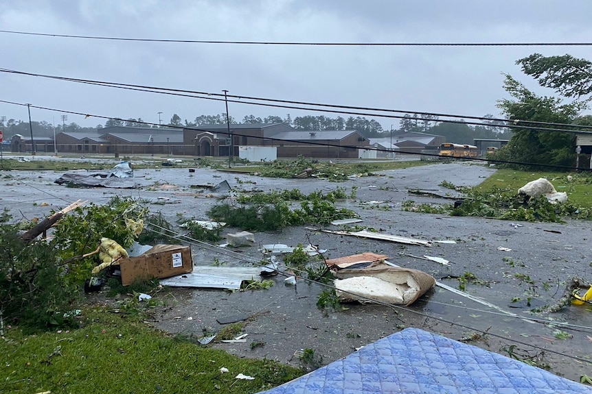 Debris covering the street in East Brewton, Alabama