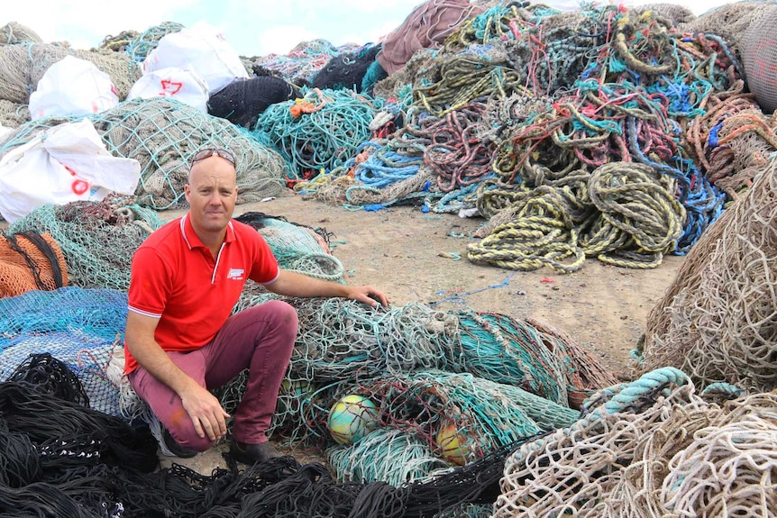 Plastic waste and nylon fishing netting collected from beach