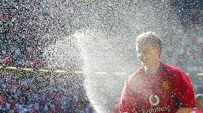 Manchester United forward Ole Gunnar Solskjaer celebrates the FA Cup victory.