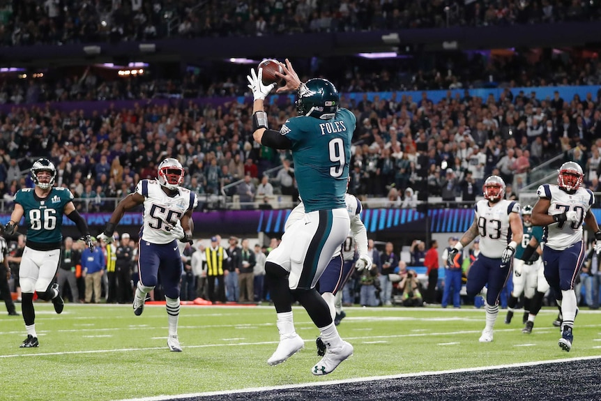 Philadelphia Eagles' Nick Foles catches a touchdown pass in Super Bowl LII.