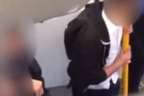 Students suspended for abusing disabled man on Sydney train