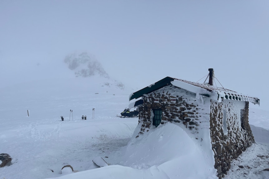 A wooden hut in the snow