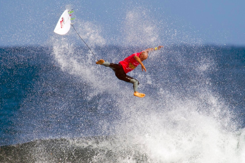 Kelly Slater wipes out during his round four loss to in Margaret River.