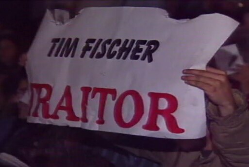 A sign says Tim Fischer traitor.