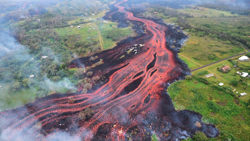 Arial view shows lava flowing from fissures