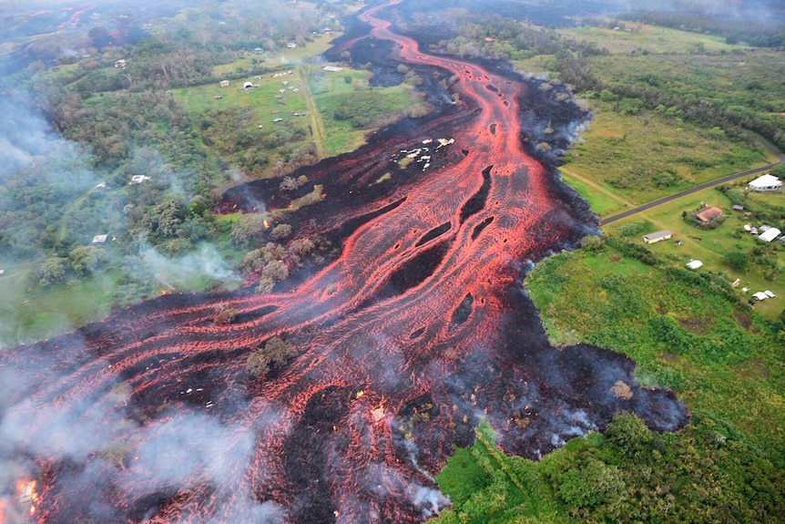 Arial view shows lava flowing from fissures