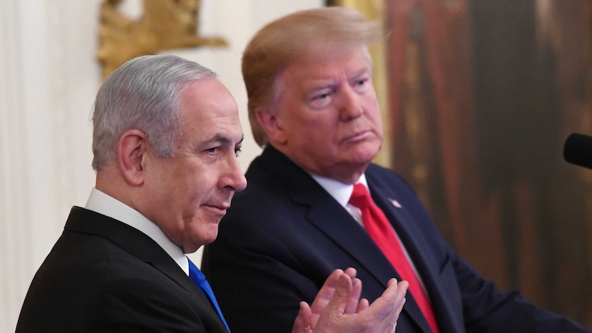 Donald Trump stands alongside Israel Minister Benjamin Netanyahu.