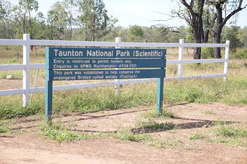 A sign saying Taunton National Park.