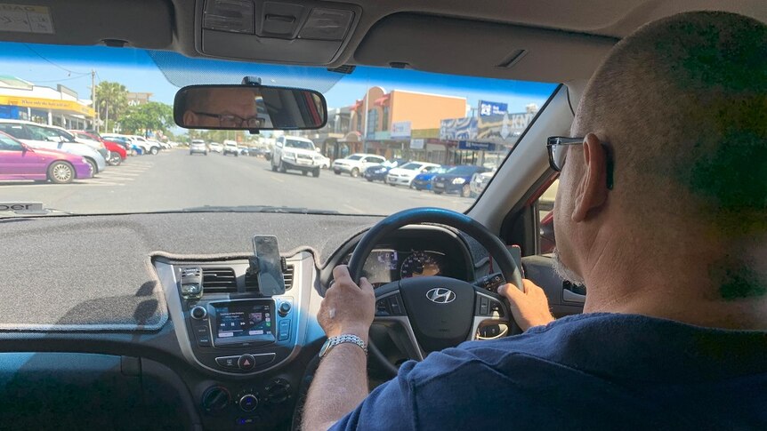 Tom Bundesen drives his car down a Rockhampton Street