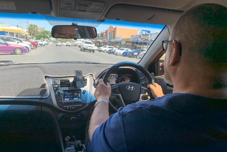 Tom Bundesen drives his car down a Rockhampton Street