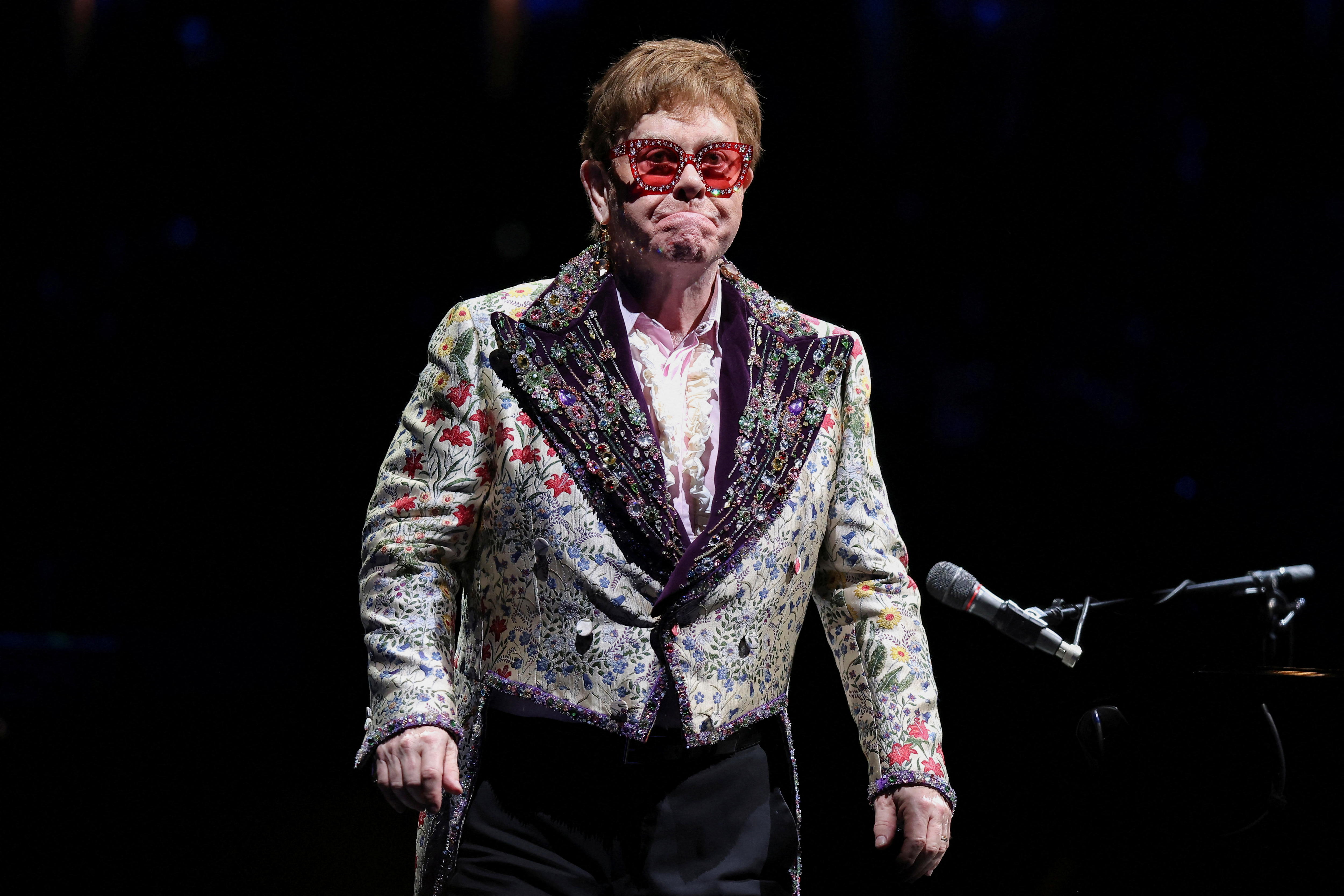 IMAGE Elton John performs on stage