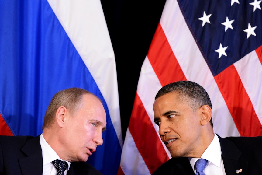 Barack Obama (R) an Vladimir Putin speak during their bilateral meeting.