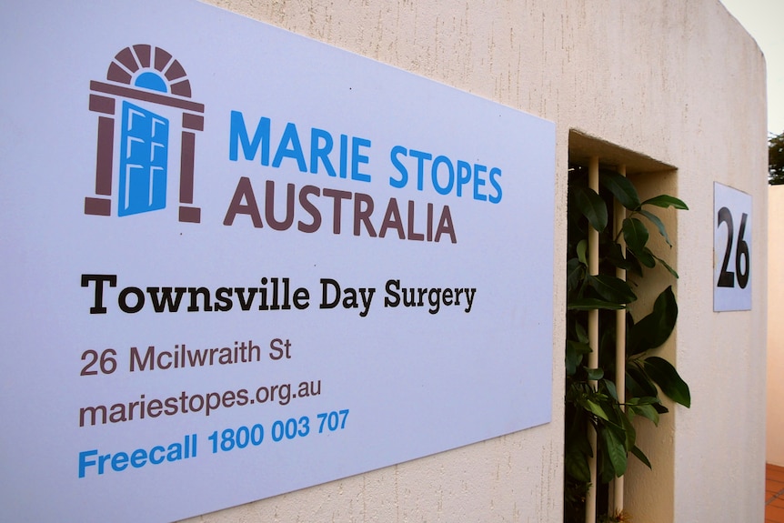 Sign on the wall outside the former Marie Stopes clinic in Townsville
