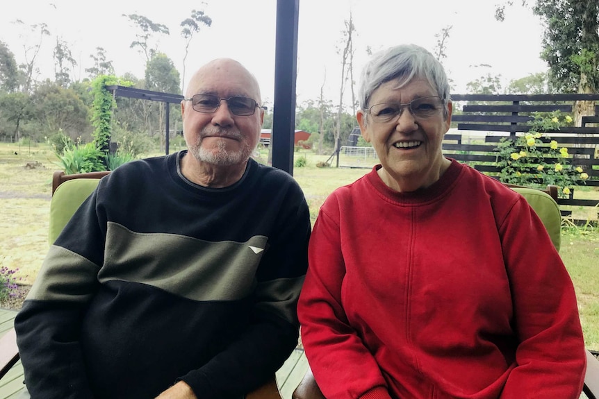 Desmond and Linda Cornford it an outdoor table