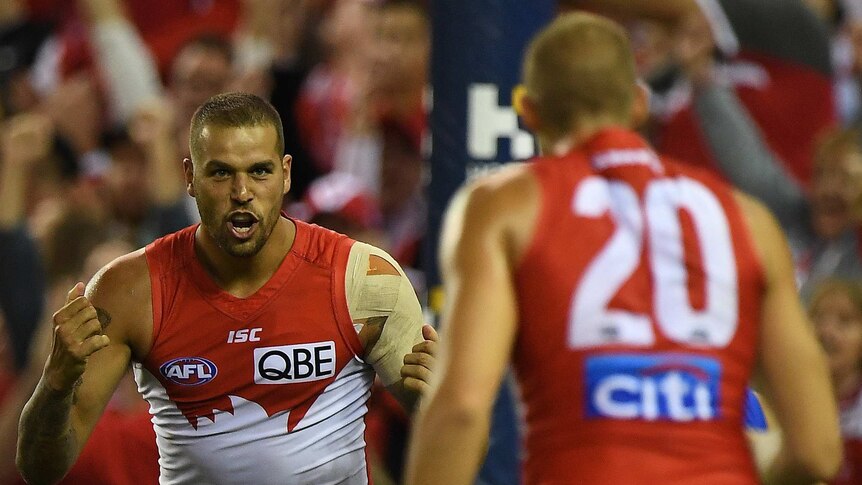 Lance Franklin and Sam Reid celebrate a goal for the Swans