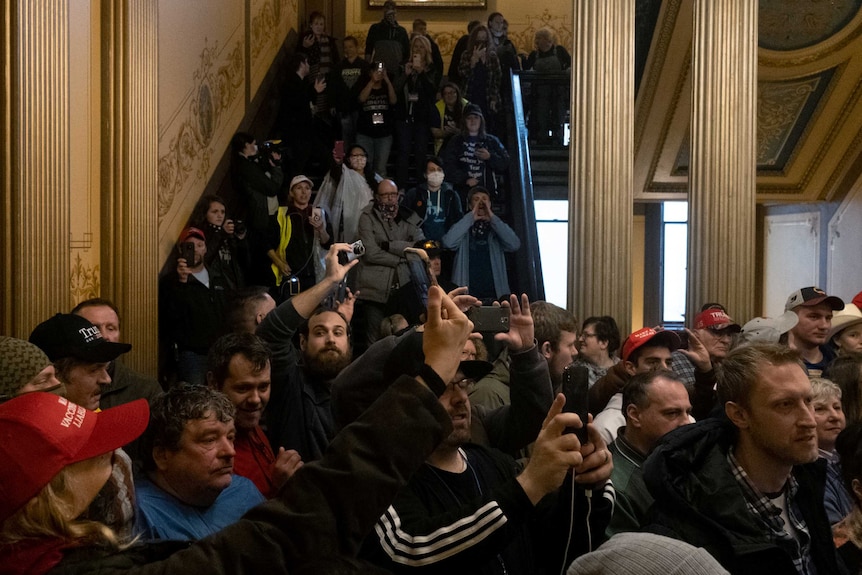 Protestors storm Michigan vote.