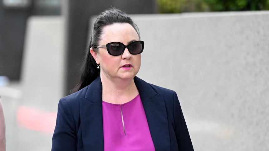 Senior forensic scientist Kylie Rika is seen leaving the Commission of Inquiry into Forensic DNA Testing in Queensland