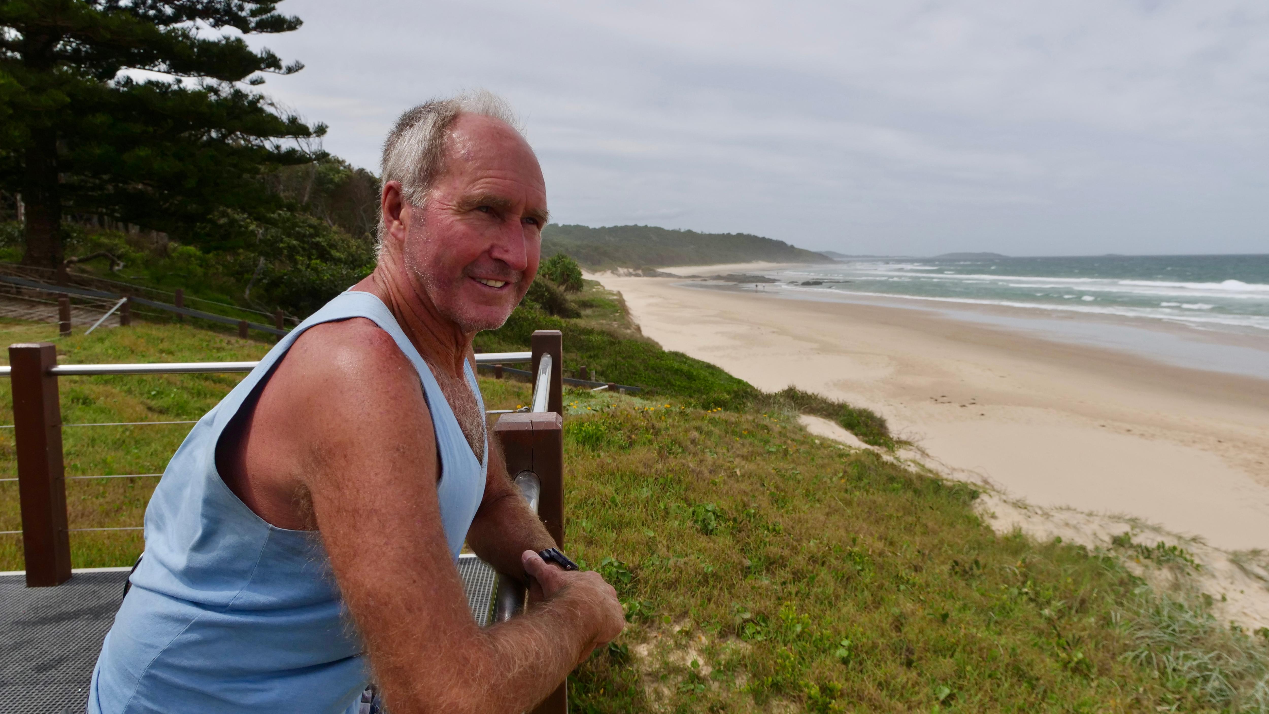 retired lifeguard Sonny Tisdell staring out at the beach in Sawtell. 