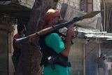 Members of the Free Syrian Army patrol in Sukari, Aleppo province.