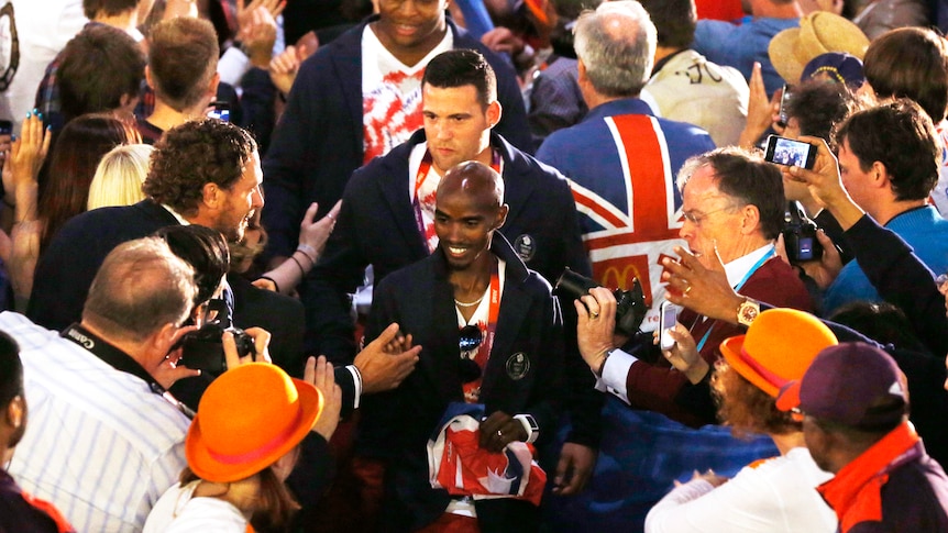 Britian's double gold medal winner Mohammed Farah arrives for the Closing Ceremony.